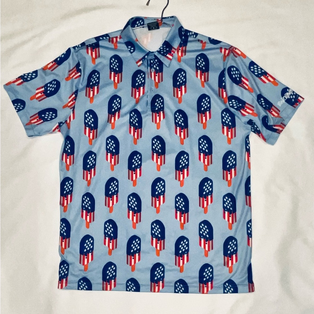 Patriotic Blue and Red Bomb Pop Men's Polo Shirt by. Golf Gods